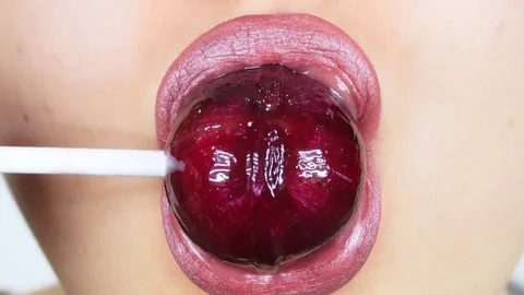 Extreme close-up of young woman's lips. Видео 112957049