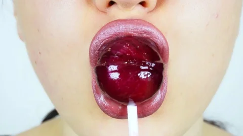 Extreme close-up of young woman's lips. Stockbeeldmateriaal 112957073