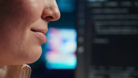 Extreme closer up shot of smiling computer engineer working Stock Footage 283689866