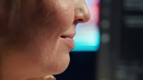 Extreme closer up shot of smiling computer engineer working Stock Footage 283689912