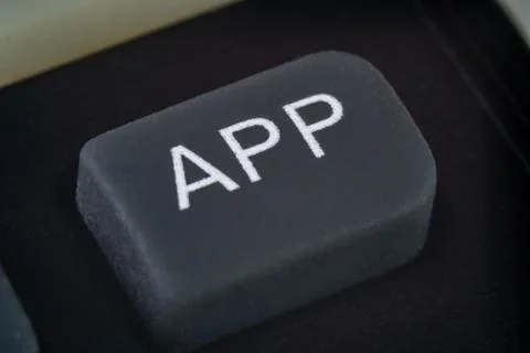 Extreme closeup of an app button on a remote Stock Photos