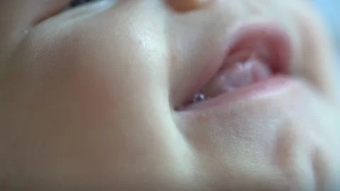 Extreme closeup of babys face while smiling. Stock Footage 166363005