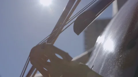 Extreme closeup of cello bow and strings in sunshine Stock Footage 111048057