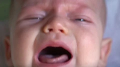 Extreme closeup of crying baby. Stock Footage 166363013