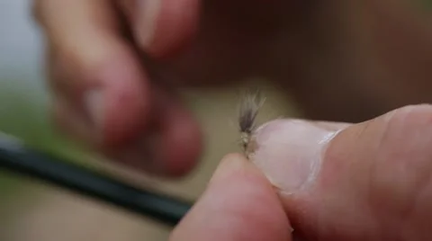 EXTREME CLOSEUP HANDS TYING FLY FOR FLYFISHING Stock Footage 51769610