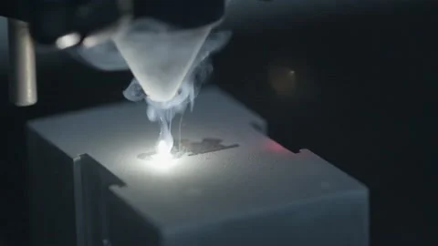 Extreme Closeup of Laser Engraving Machine Etching Design into Metal Block Stock Footage 138796905