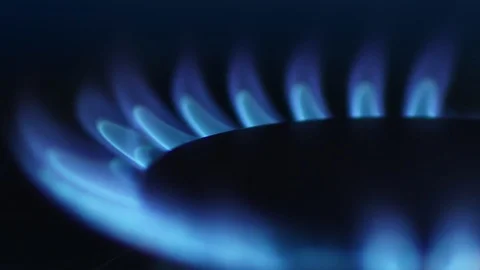 Extreme closeup motion burned glowing flame with natural blue light macro shot Stock Footage 127080772