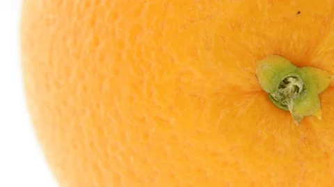 Extreme closeup of orange fruit - pan orange peel with pores visible Stock Footage 104528401