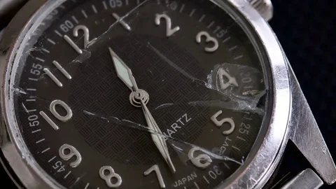 Extreme closeup Second hand ticks off time on watch with broken crystal Stock Footage 72350299