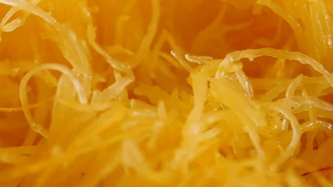 Extreme Closeup on Strands of Spaghetti Squash Stock Footage 125121029