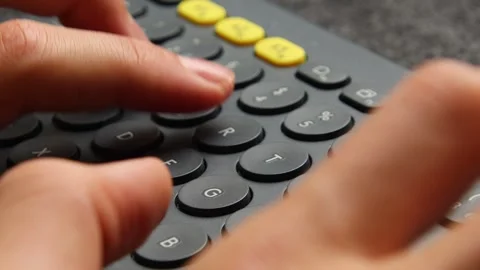 Extreme Closeup Typing On Keyboard Video stock 288981530