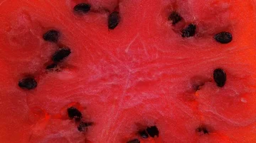 Extreme closeup view of red watermelon rotating in 4K 動画素材 85607105
