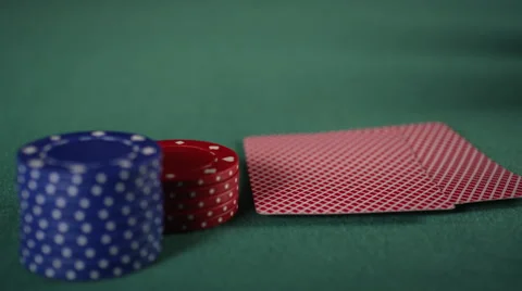 Extreme CU of player lifting edge of cards up and revealing a pair of aces Stock Footage 53233278