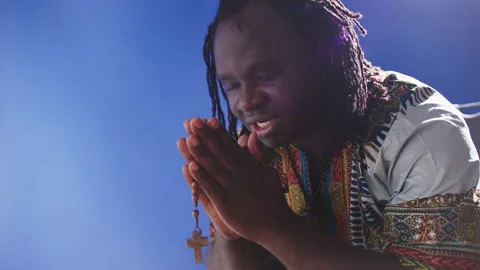 Extreme devotion for christian faith prayers - African man i traditional Stock-Footage 142030215