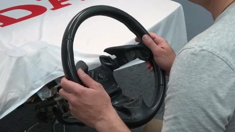 Extreme driving school - learning to drive, fast steering wheel turn and rotatio Stock Footage 91322194