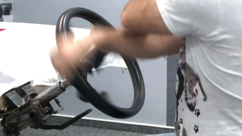 Extreme driving school - learning to drive, fast steering wheel turn and rotatio Video stock 94771909