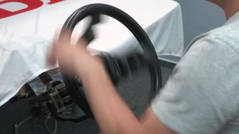 Extreme driving school - learning to drive, fast steering wheel turn and rotatio Stock Footage 94771932