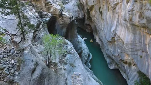 Extreme drone flight between rocks in a canyon Stock Footage 168402461