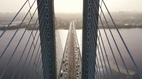 Extreme flight over the bridge with a view of busy traffic cars and the subway Stock Footage 156496368
