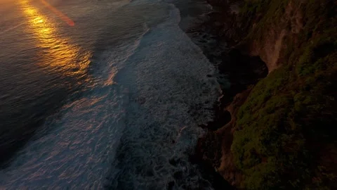 Extreme FPV Drone Dive Along Karang Boma Cliff At Sunset, First Person Descent A Stock Footage 336636770