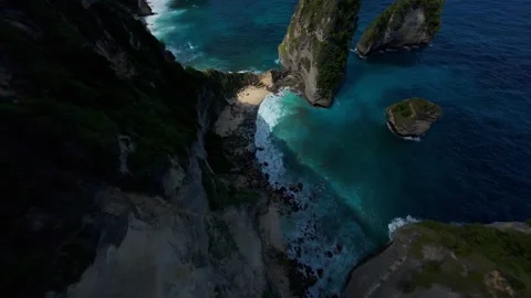 Extreme FPV Drone Dive From Cliff Edge Above Diamond Beach On Nusa Penida, First Stock Footage 336634391