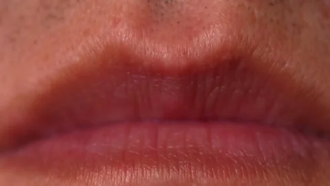 Extreme hyper-detailed macro close-up of closed neutral human lips. Stock Footage 328661082