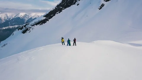 Extreme long shot group of active sport people standing on top of mountain Stock Footage 120835743