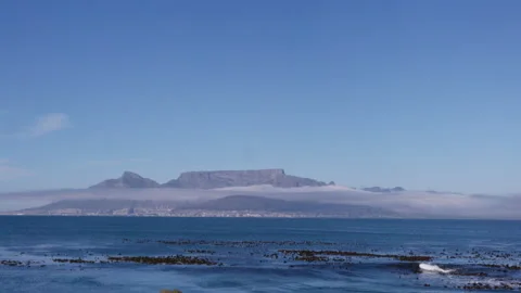 Extreme long shot: Looking across the ocean at Table Mountain. HD50p Stock Footage 242014686