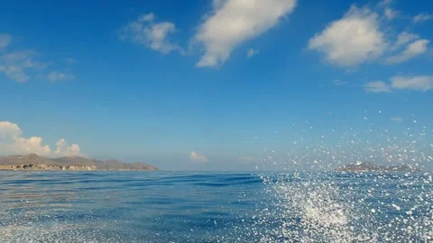 Extreme low angle water surface pov of Favignana coastline Vídeo Stock 278942841