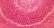 Extreme Macro Of Bubbles In Pink Jello Cream (Gel). 4K. Stock Footage