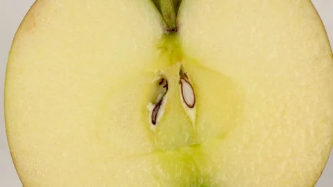 Extreme Macro Close Up Of Fresh Apple Flesh Texture Rotating 4K Stock Footage 321866539