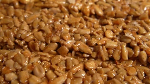 Extreme macro close-up of glossy caramelized Stock Footage 329566917