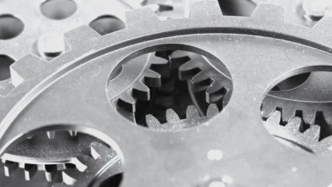 Extreme Macro Close-Up of Interlocking Dark Metal Gears Stock Footage 340531240