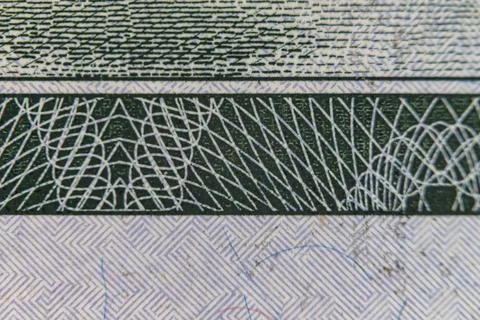 Extreme macro close up of microprinting typography and security pattern on .. Stock Photos