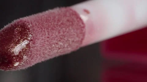 Extreme Macro Close Up of Red Lipstick Pigment on Cosmetic Applicator Showing Stock-Footage 345102057