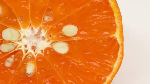 Extreme Macro Close Up of Sliced Orange Texture 4K Stock Footage 319452431