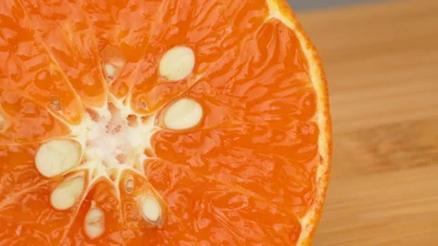 Extreme Macro Close Up of Sliced Orange Texture 4K Stock Footage 319452639