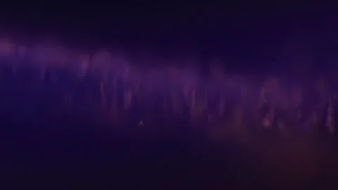 Extreme Macro Closeup Of  Blue Particles Jumping On Music Speaker Stock Footage 252945970