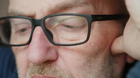 Extreme Macro of Middle Aged Mans Moving Eyes Reading Glasses Stock Footage 332188769