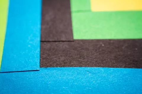 Extreme macro of multicolor background from different colors papers Stock Photos
