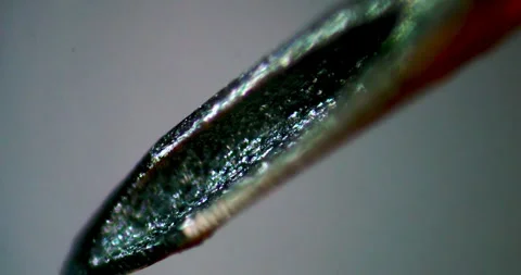 Extreme Macro View Rotating Counter Clockwise showing Microscopic Tip of Stock Footage 330956810