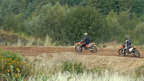 Extreme Motocross Rider on dirt track - super slow motion - documentary Stock Footage