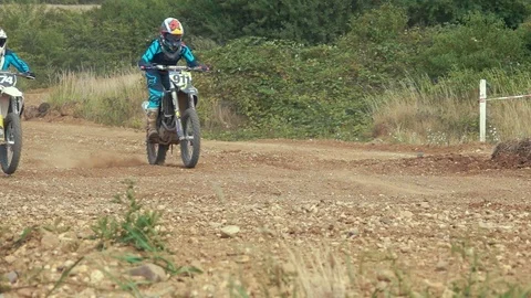 Extreme Motocross Rider on dirt track - super slow motion - documentary Stock Footage