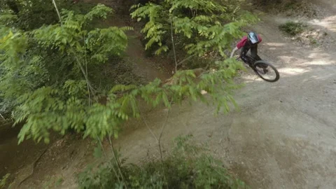 Extreme Mountain Biker Jumping Stock Footage 139715474