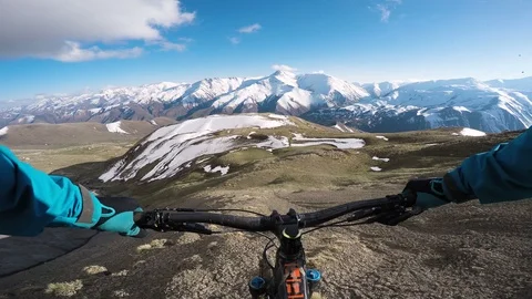 Extreme Mountain Biker Riding Down A Big Mountain With Scenic Views 스톡 동영상 101573645