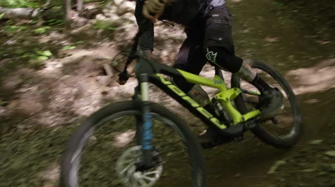 Extreme Mountain Biking - railing around a berm on a trail Video stock 64509990