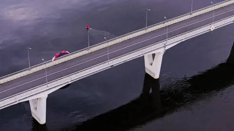 Extreme Paraglider Flies Under Bridge Above Nemunas River In Jurbarkas Lithuania Stock Footage 318949116