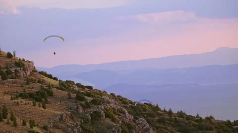 Extreme Paragliders Over Mountains Stock Footage 310752131