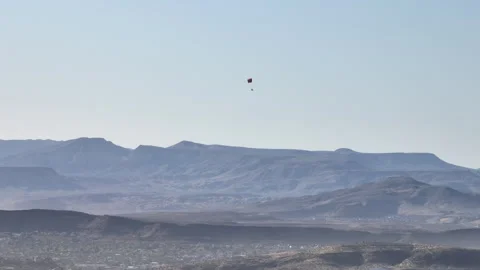 Extreme Paragliding Over Remote Rocky Terrain in Utah 動画素材 313756085