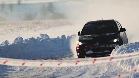 Extreme rally racing driver rides fast on the snowy road 库存影片 59651225